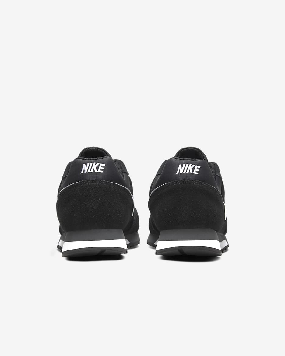 Nike black and white md runner best sale